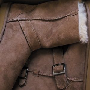 Shearling buckle boots